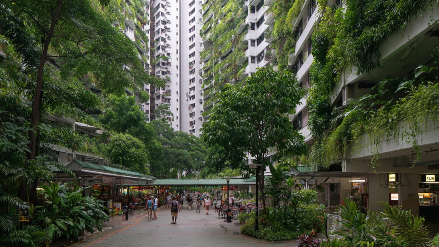 A Singapore street with shaded sidewalks, public housing towers, lush planting, a hawker centre edge and pedestrians moving through humid evening light